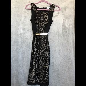 Sophisticated intricate black dress !! Must have !